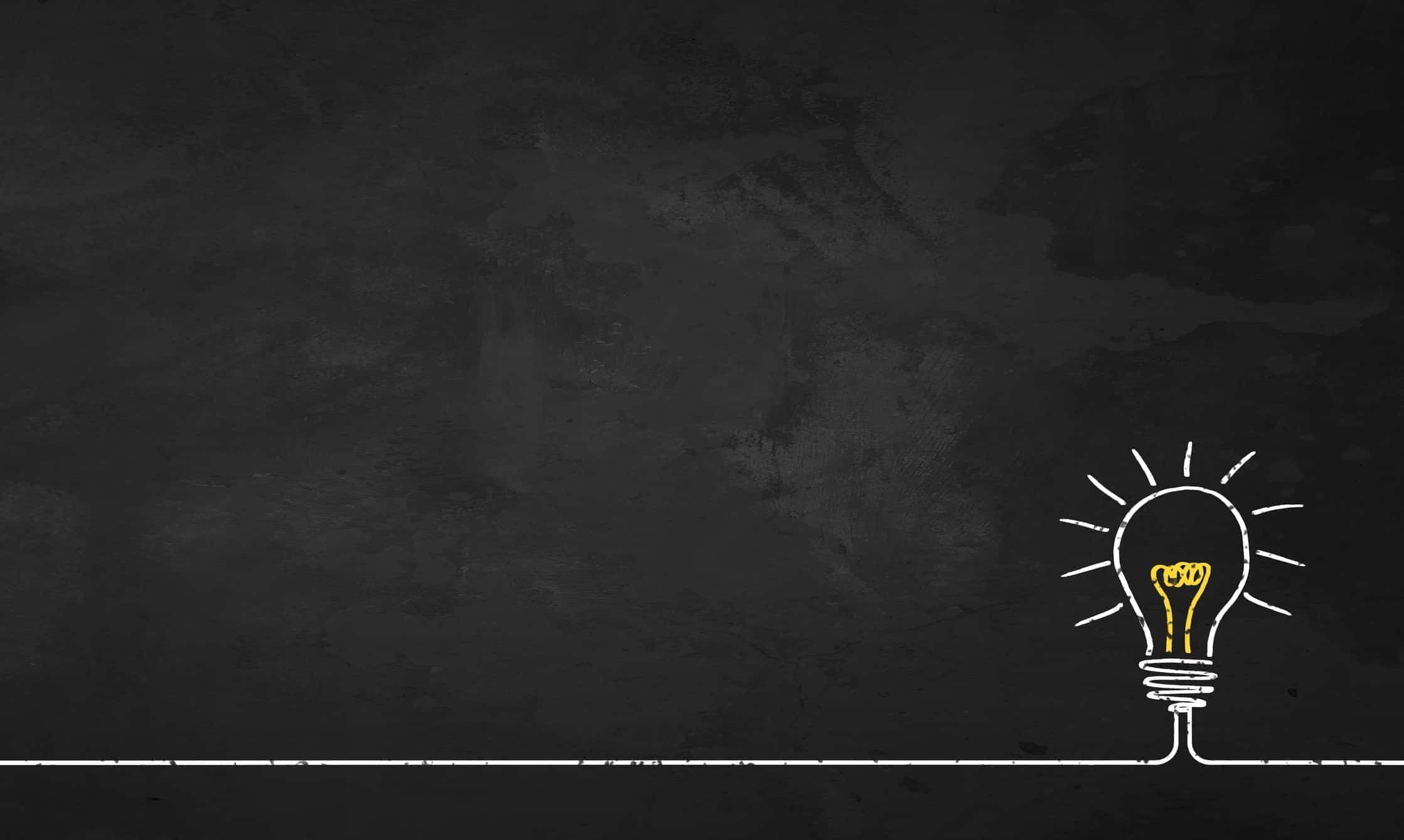 Chalkboard with a glowing Light Bulb