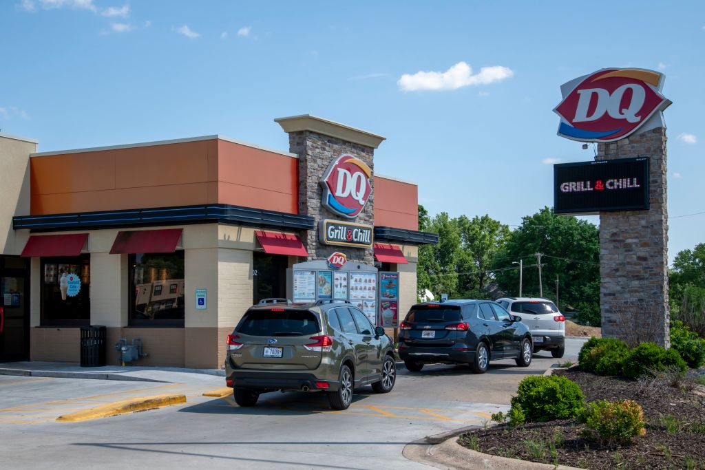 Cars lined up in the drive thru lane to pick up their food at the local Dairy Queen in Lansing, Kansas