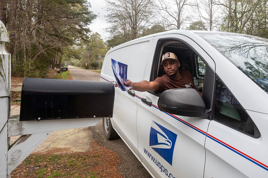 Postal Employee Delivers U.S. Mail