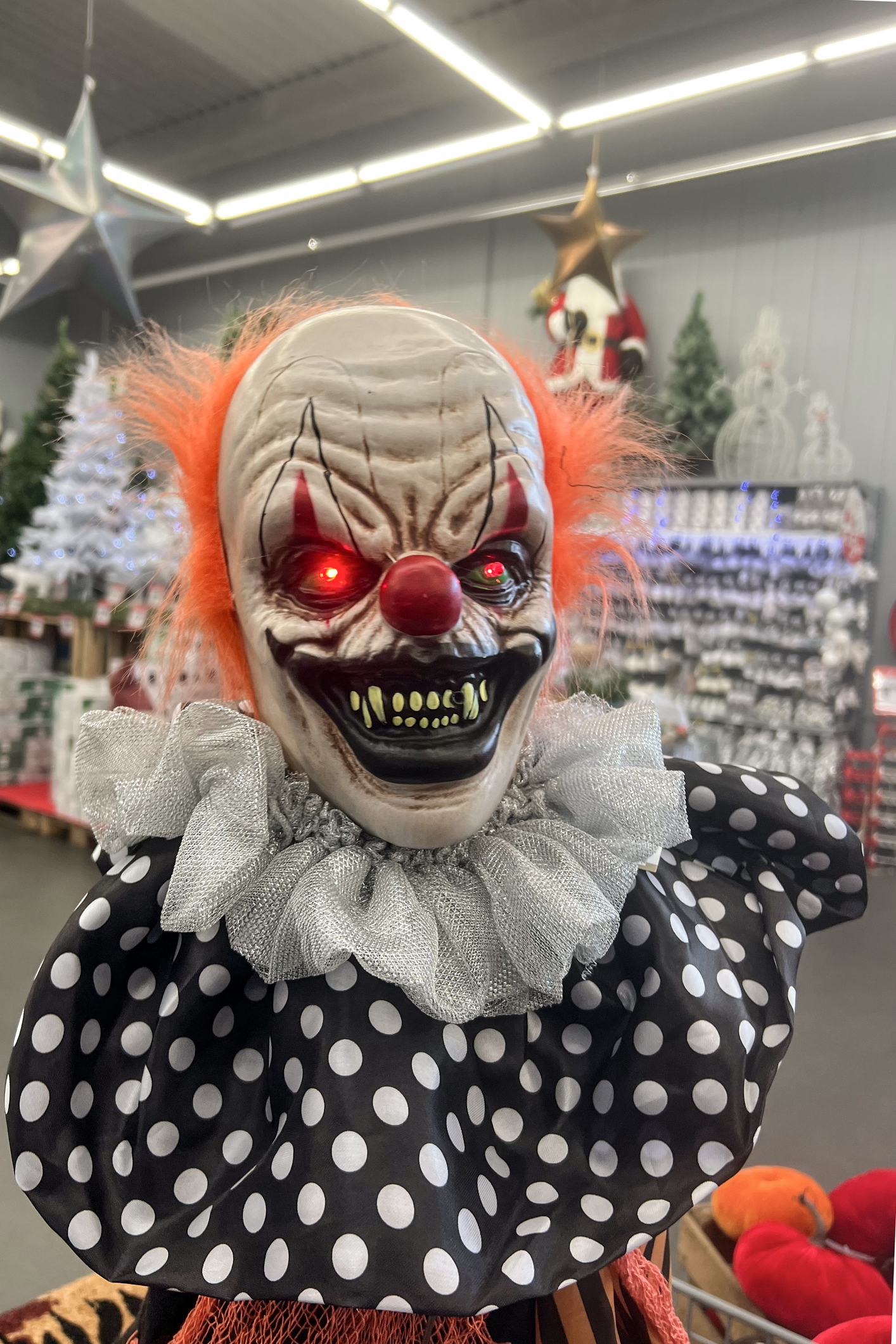 Scary clown Zombie in a shop Halloween Costume Store
