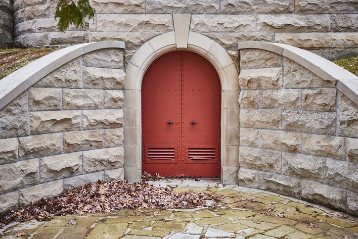 Red Door Entrance at Historical Cemetery - Gothic Style Arch